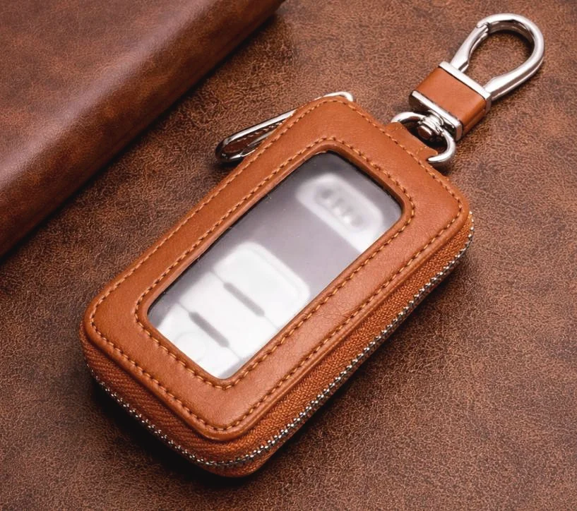 Brown leather car key case with metal clip