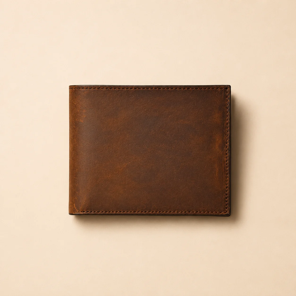 Flat exterior view of brown leather bifold wallet